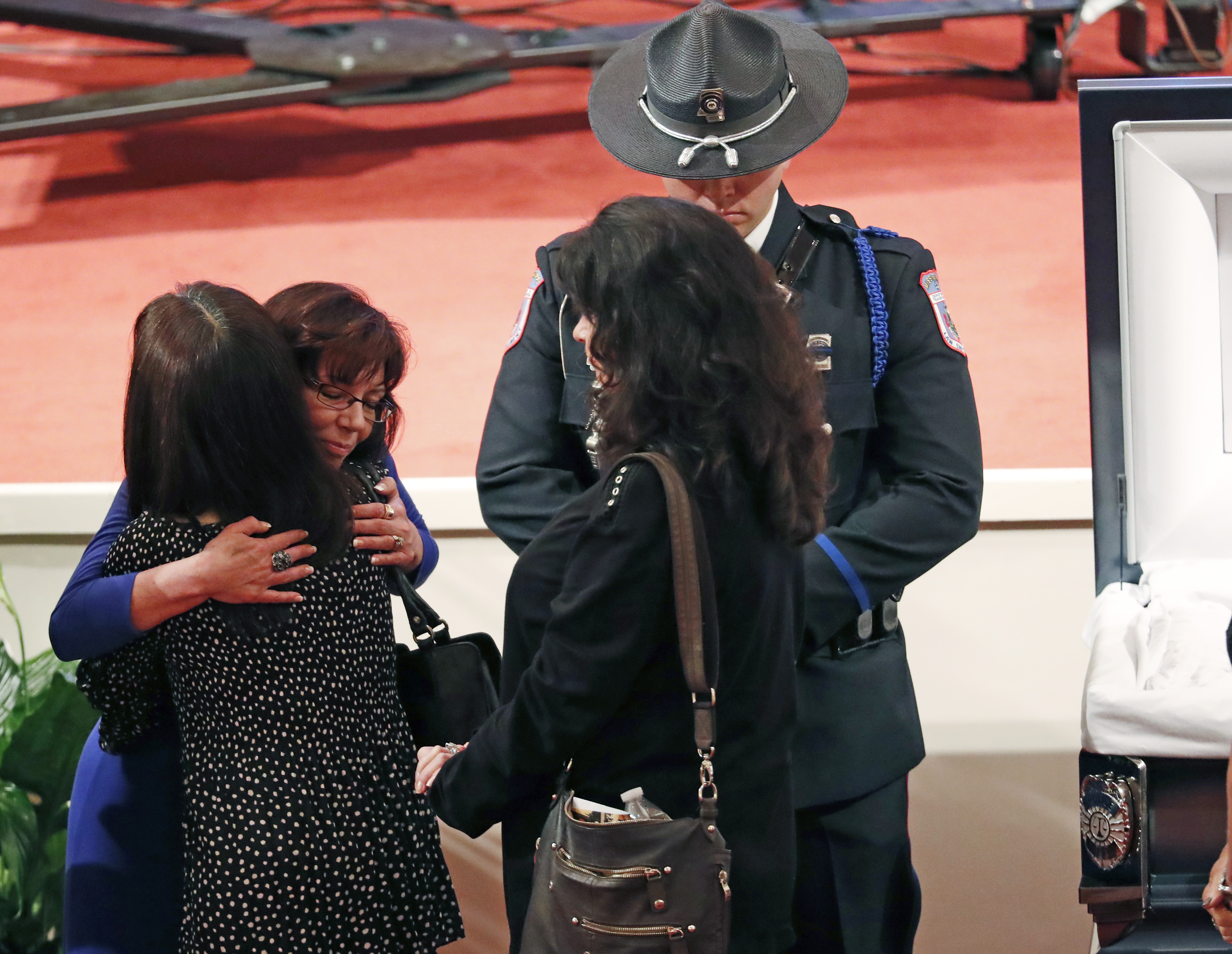 The Latest: Slain police officer called a 'man of integrity'