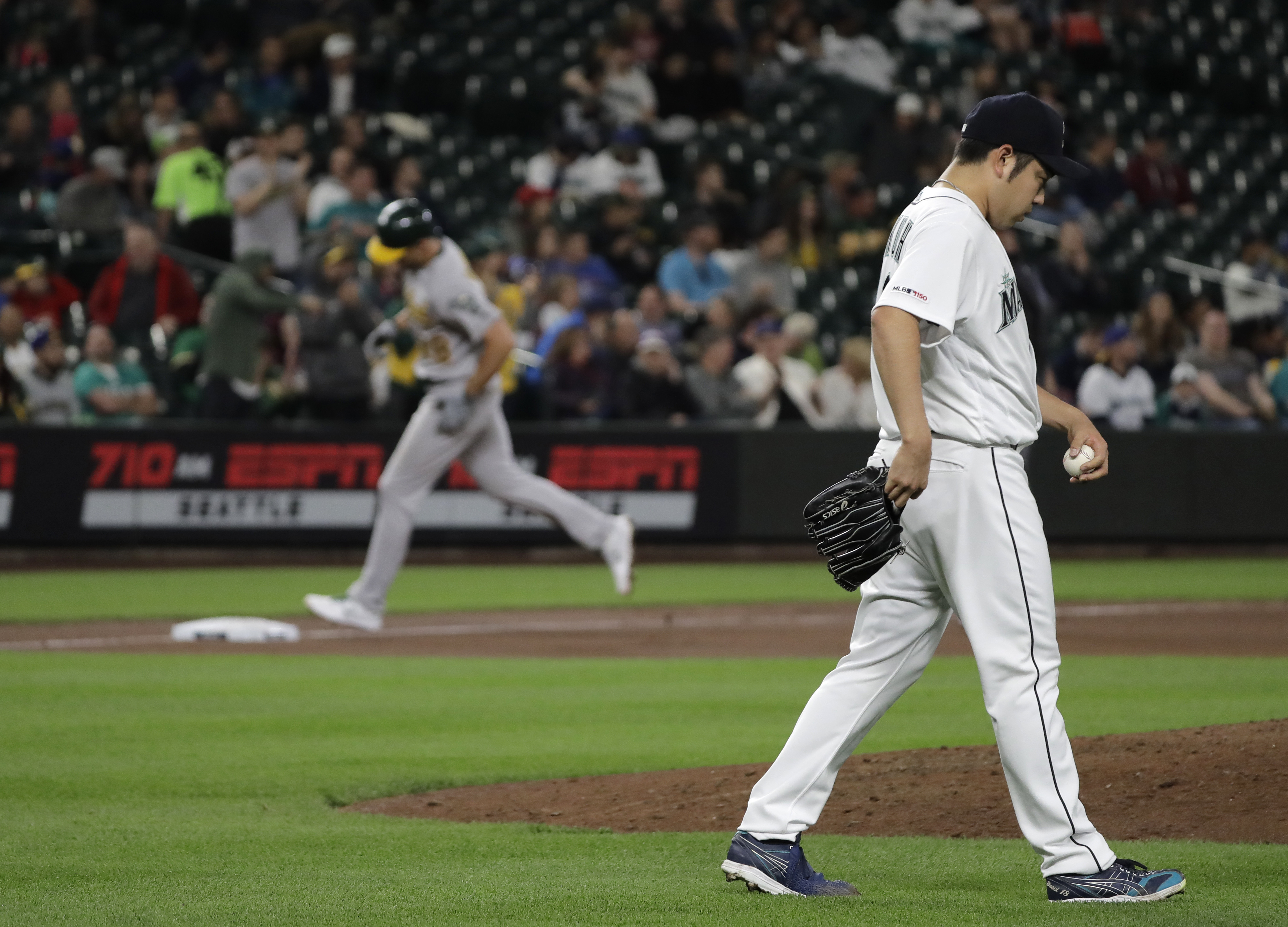 Mariners rally with 2 runs in 10th to beat A's 6-5