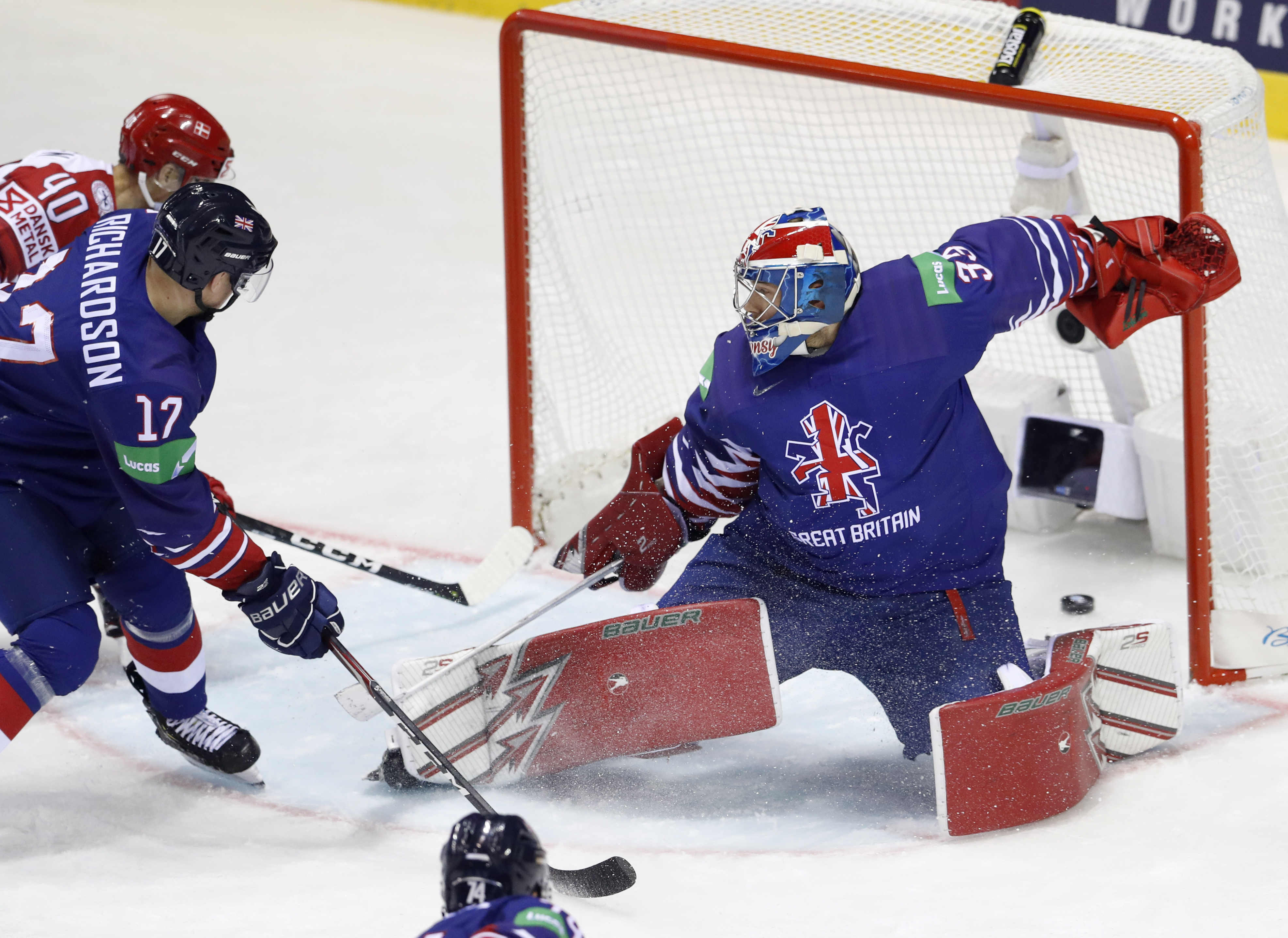 Switzerland blanks Austria, Germany wins at hockey worlds