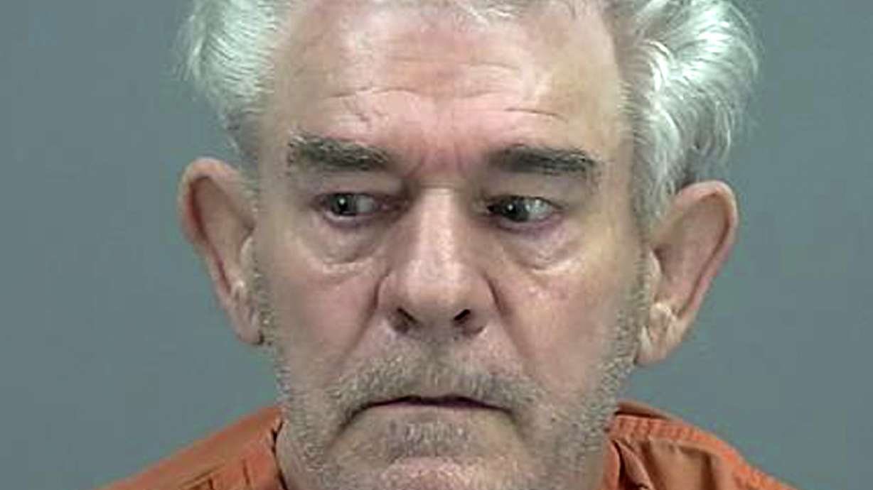 The Latest: Police say video shows man moving wife's body