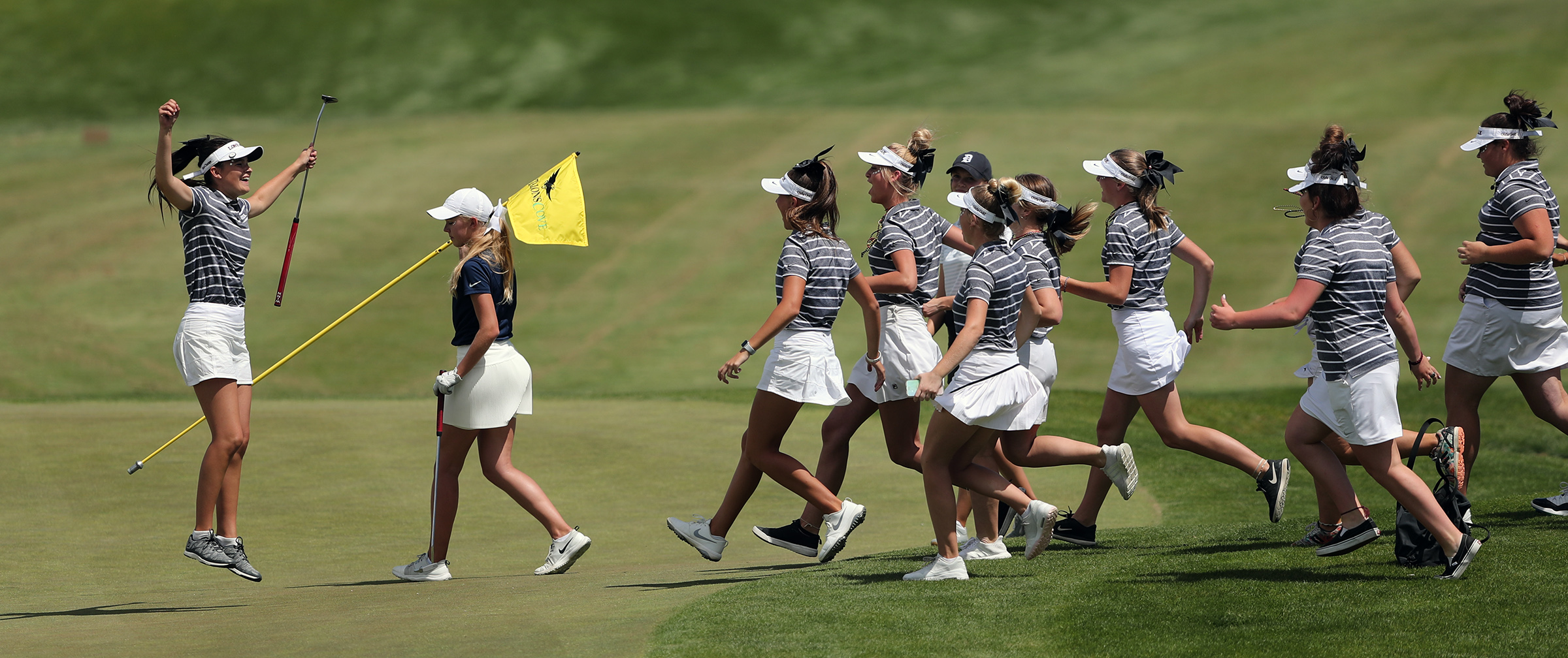Lone Peak's team celebrates their 6A team win on the 18th green in the 6A golf championships at Talon's Cove in Saratoga Springs on Tuesday, May 14, 2019. (Photo: Scott G Winterton, KSL)