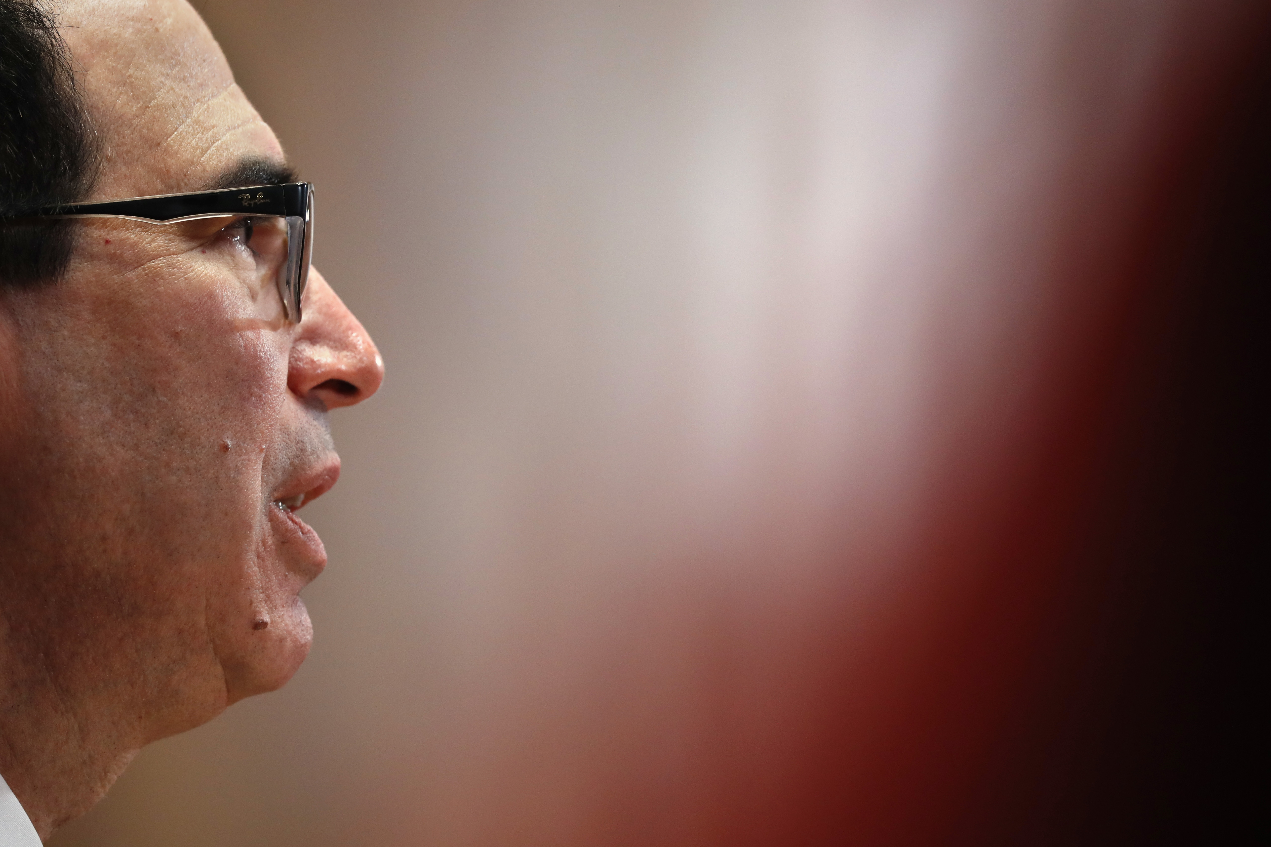 Mnuchin says courts need to settle fight over Trump's taxes