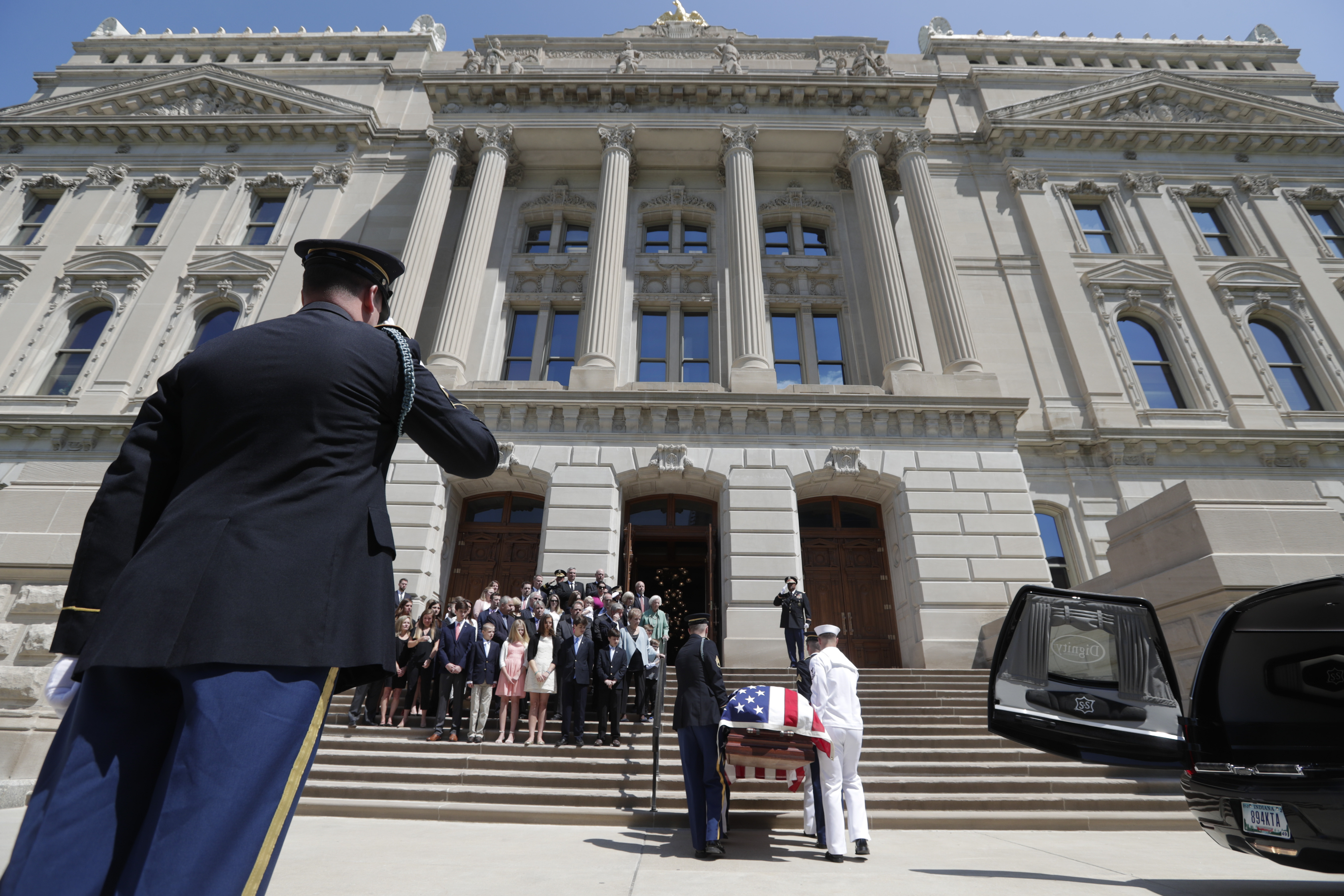 The Latest: Pence says Lugar underscored peace, freedom