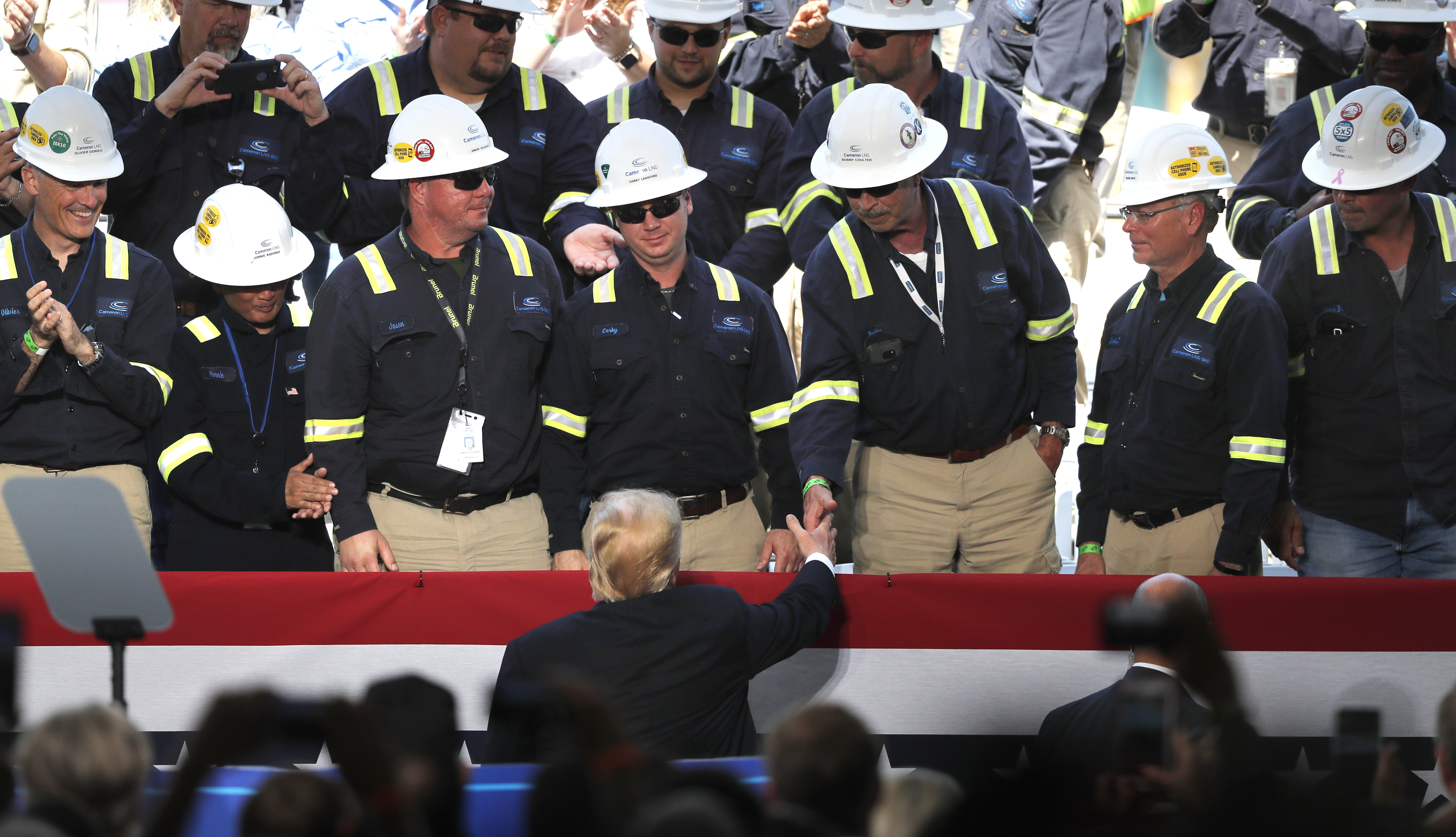 Want a bridge? Trump blurs line between governing, campaign