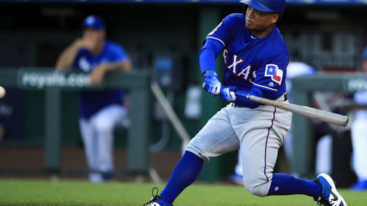 Guzman, Calhoun go deep as Rangers roll past Royals, 6-1