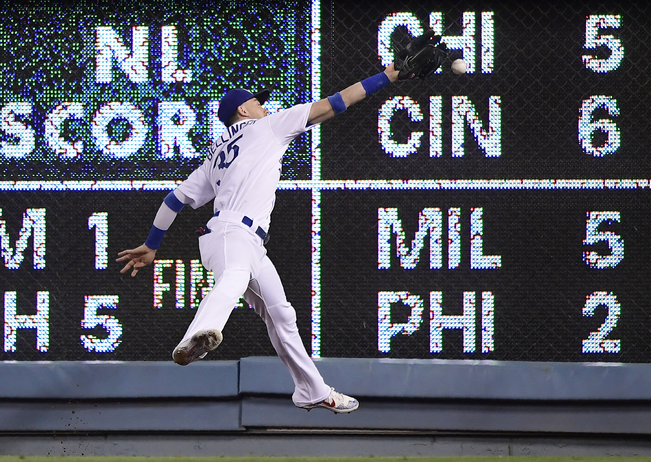 Maeda strikes out 12, drives in 2 as Dodgers top Padres 2-0