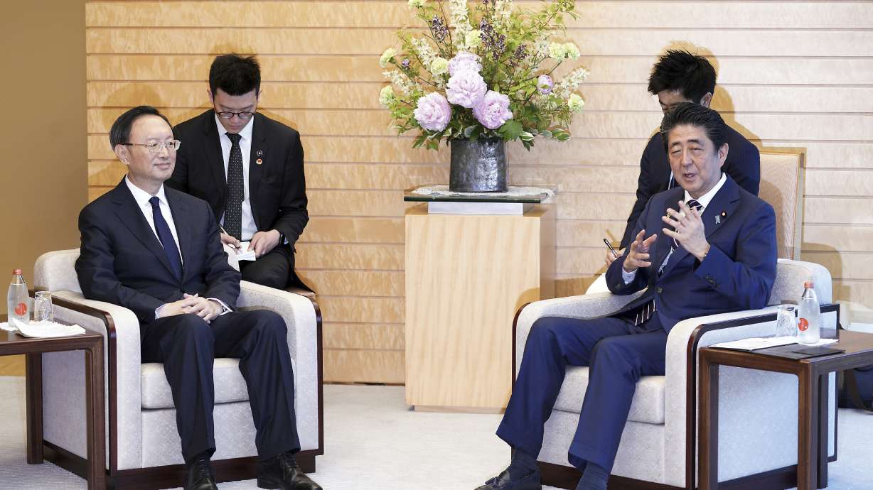 Japan, China agree to boost relations ahead of Xi visit