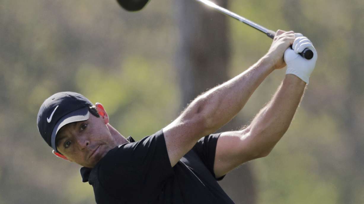 McIlroy's rally on second 9 saves him for weekend at PGA