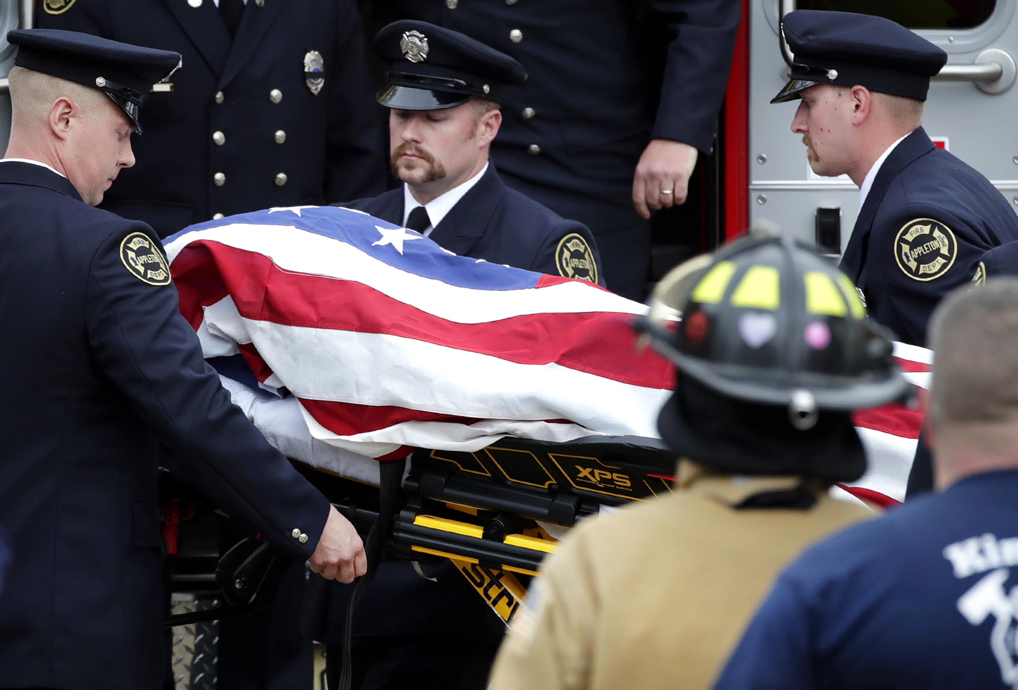 The Latest: Man in Wisconsin shooting faced drug charges