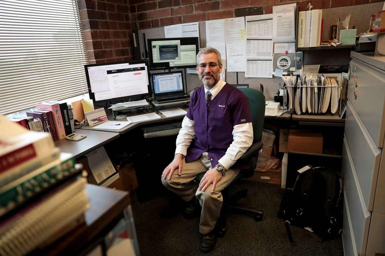 Registered nurse Al Romeo poses for a portrait at his desk in the Pregnancy Risk Line call center, which is celebrating 35 years of service, at a Utah Department of Health office in Millcreek on Friday, May 17, 2019. (Photo: Spenser Heaps, KSL)