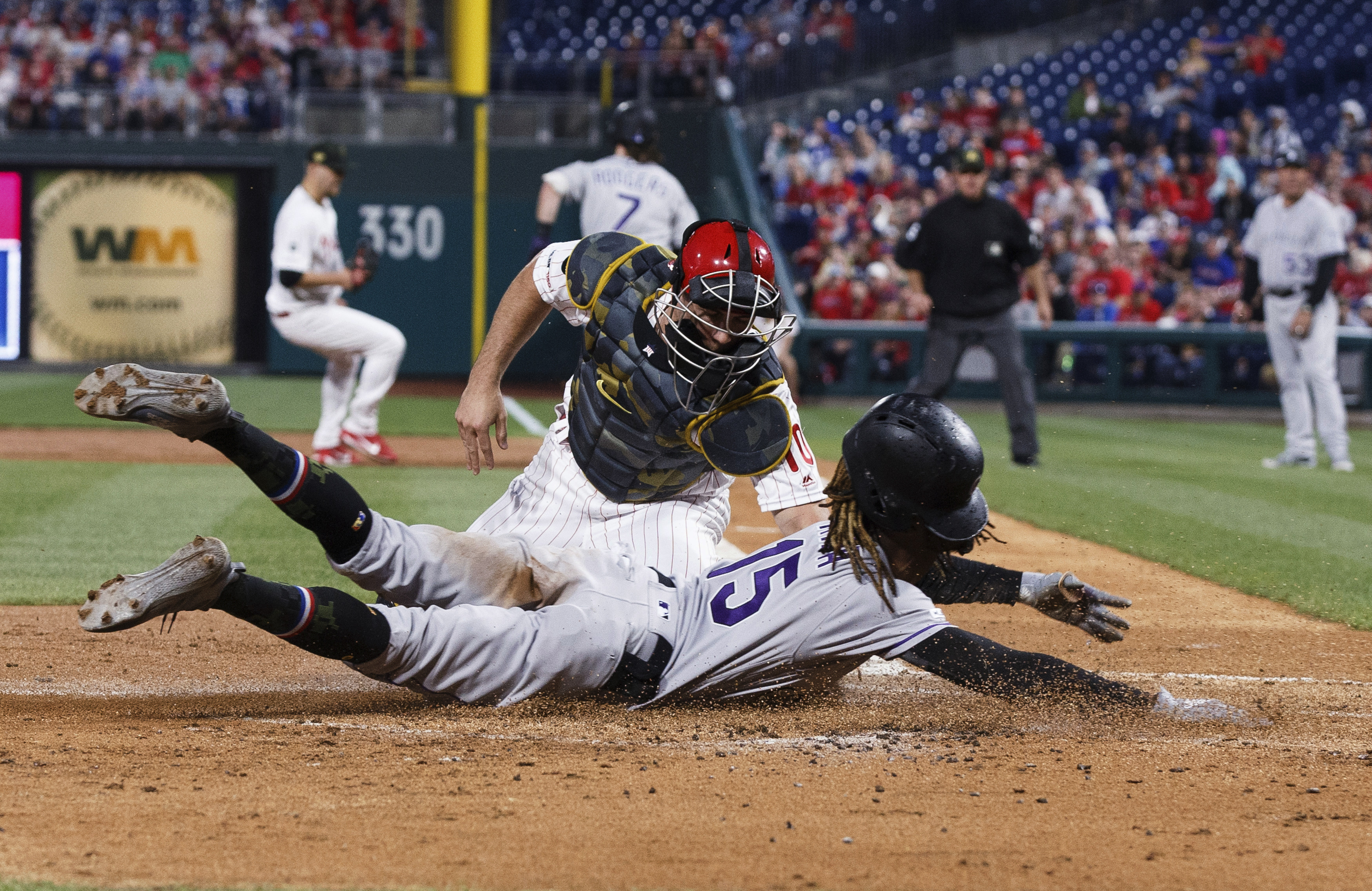 McCutchen, Harper lead Phillies over Rockies 5-4
