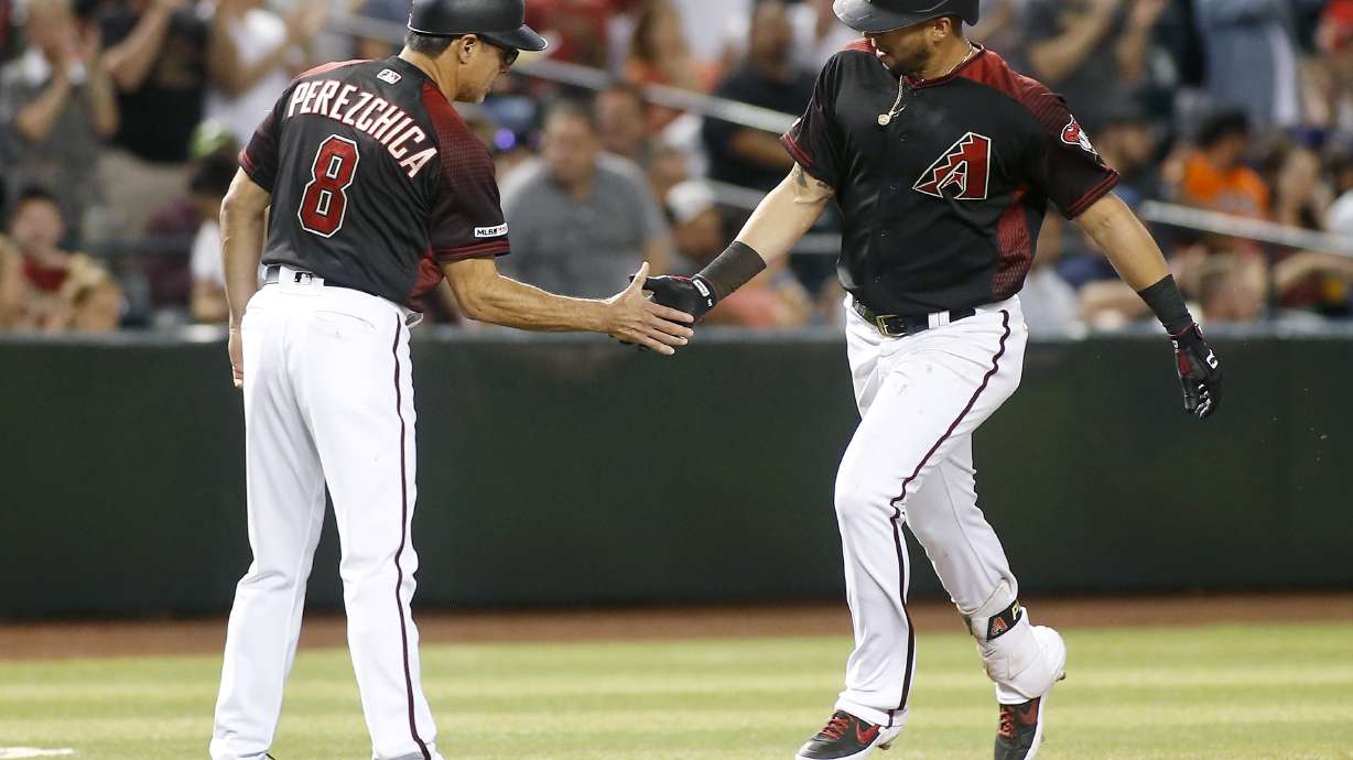 Escobar's 3-run triple helps Diamondbacks beat Giants 7-0