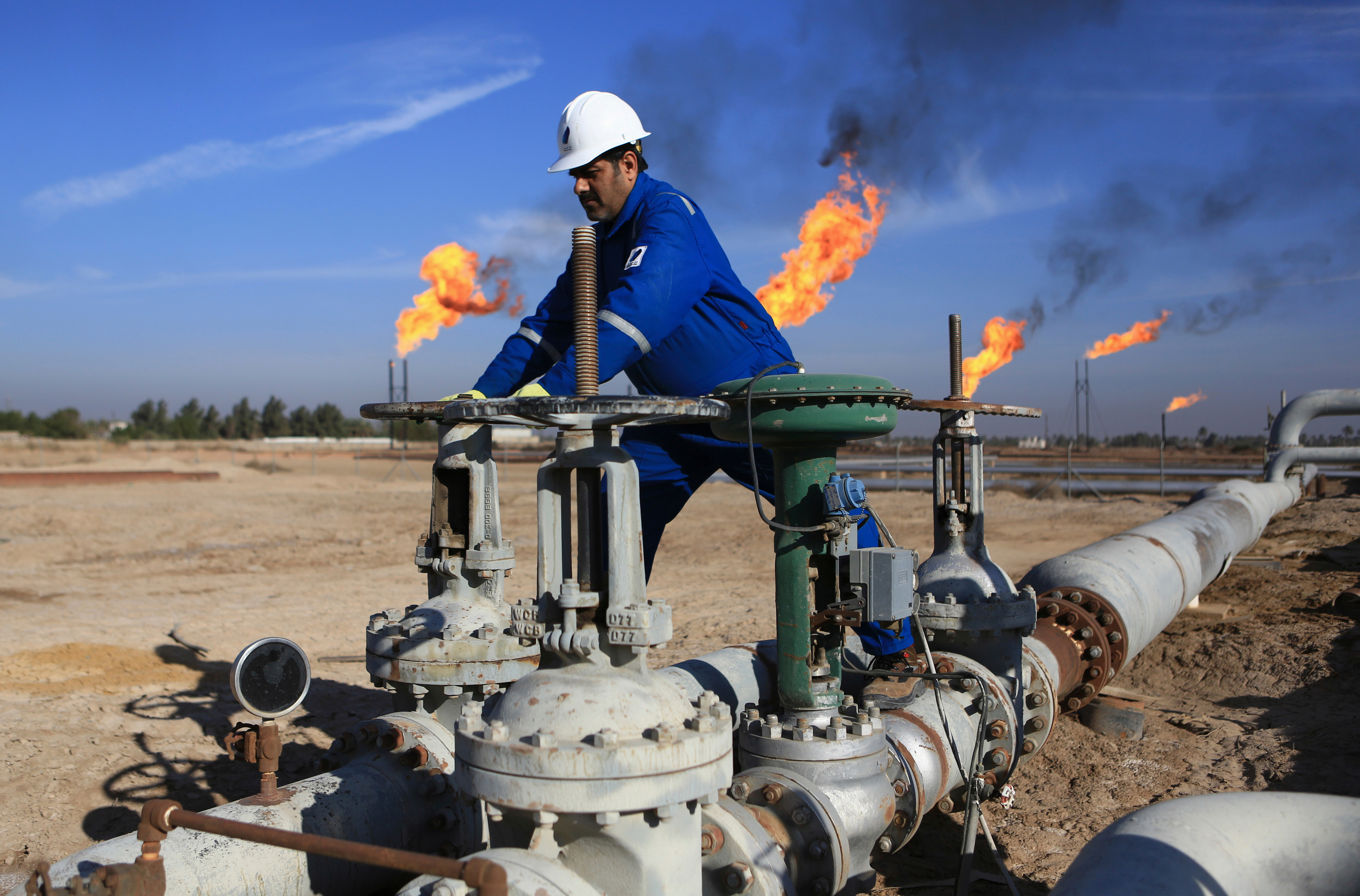 ExxonMobil employees evacuating oil field in southern Iraq