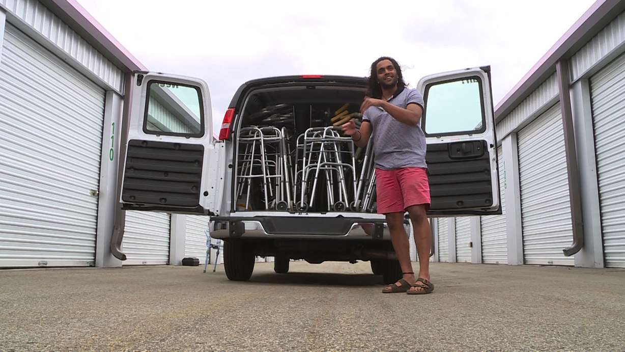University of Utah Student Mohan Sudabattula stands in front of a van packed full of medical supplies headed for the Navajo Nation community of Montezuma Creek. (Photo: Sean Estes, KSL TV)