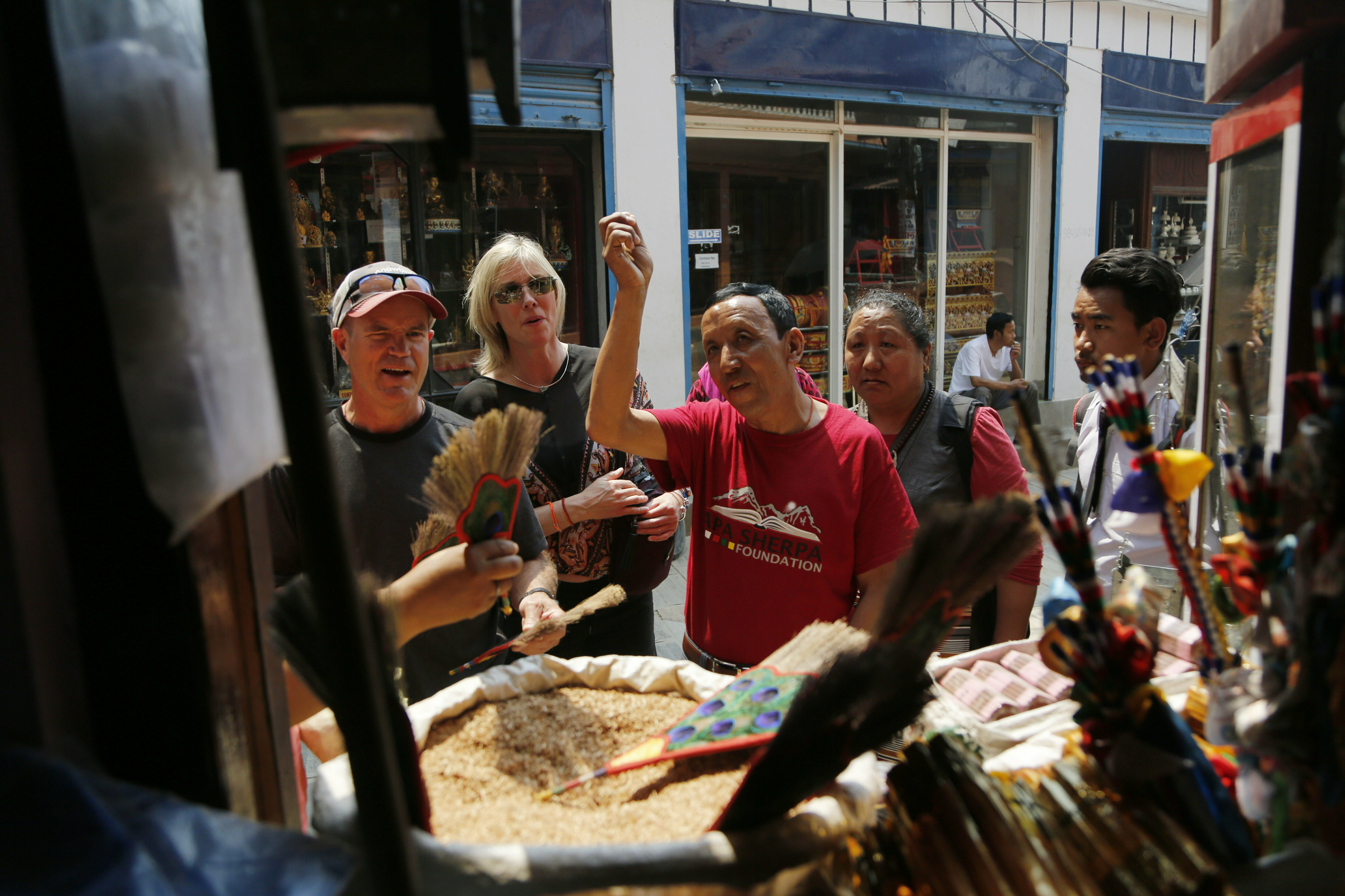 In this May 9, 2019 photo, Apa Sherpa, center, with members of his foundation walk around Boudhanath Stupa in Kathmandu, Nepal. Photo: Niranjan Shrestha, AP Photo