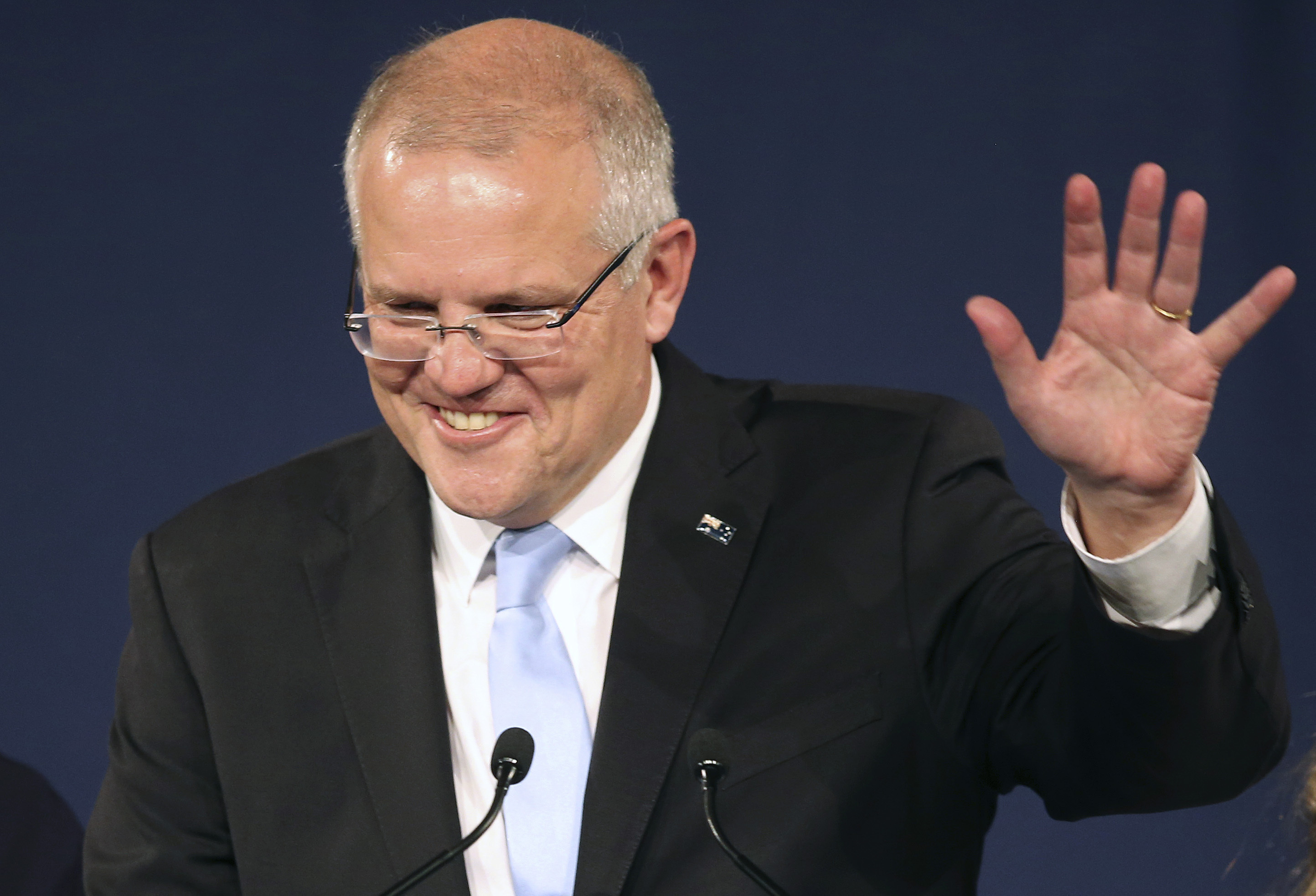 Australia's prime minister set to form majority government