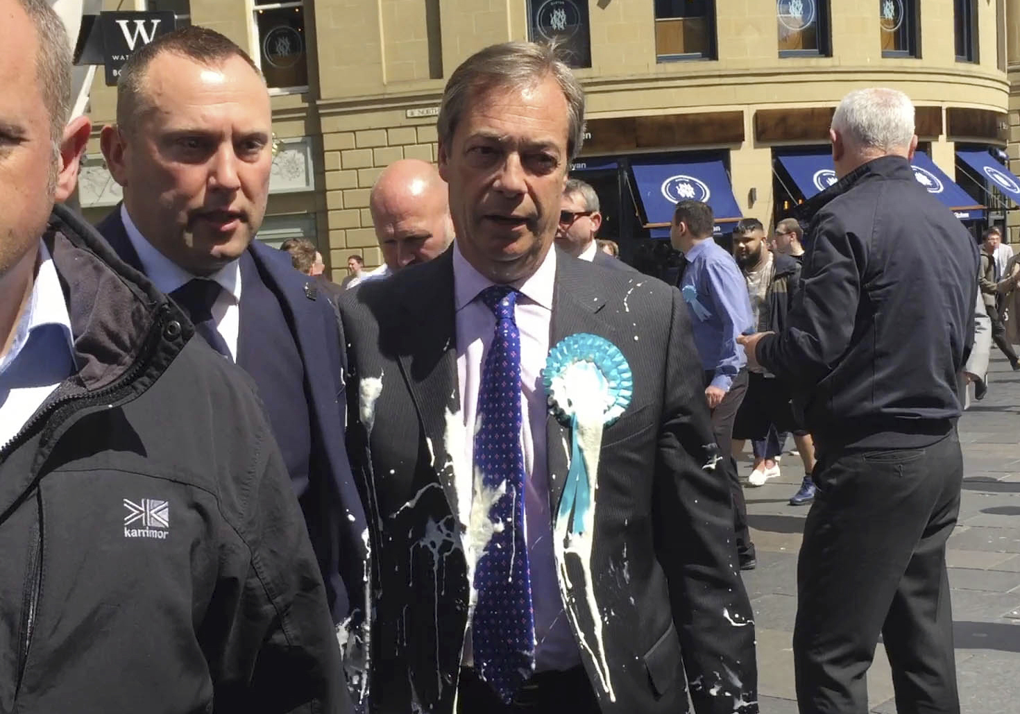 Brexiteer Farage splattered in latest UK milkshake attack