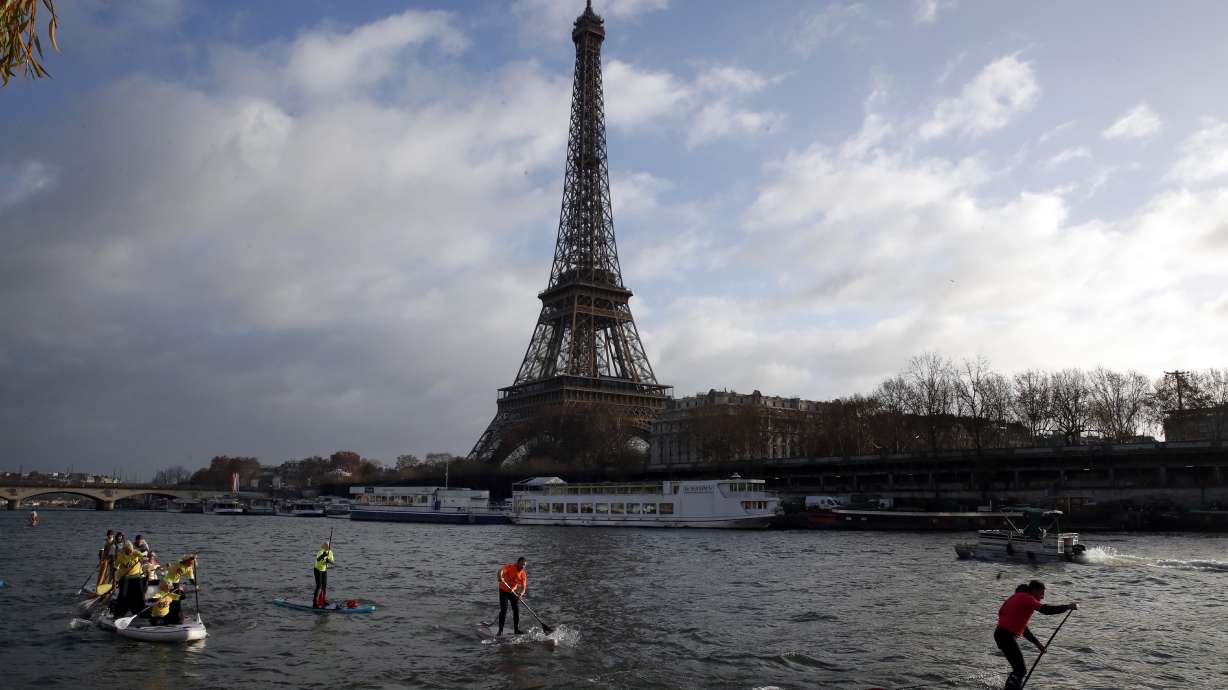 Rescuers finally persuade Eiffel Tower climber to come down