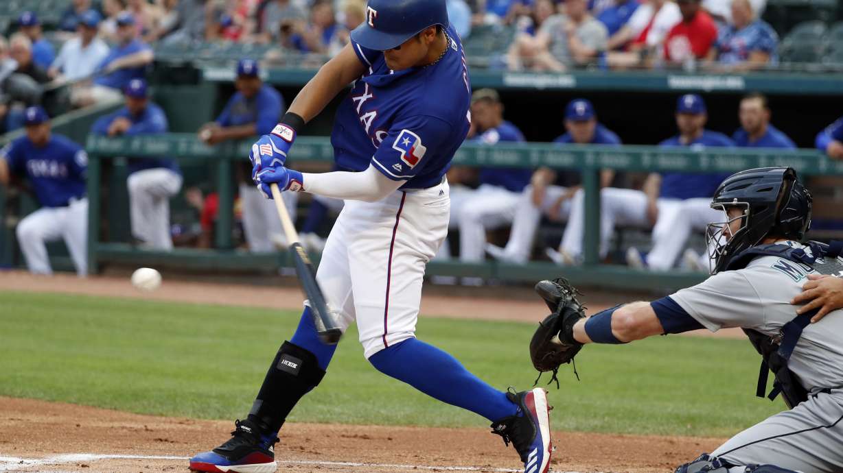 Minor 11 Ks, Rangers 5 homers in 10-9 win over Mariners
