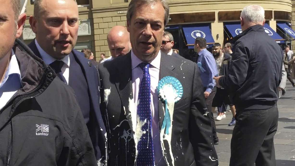 UK man charged with assault over Farage milkshake-throwing