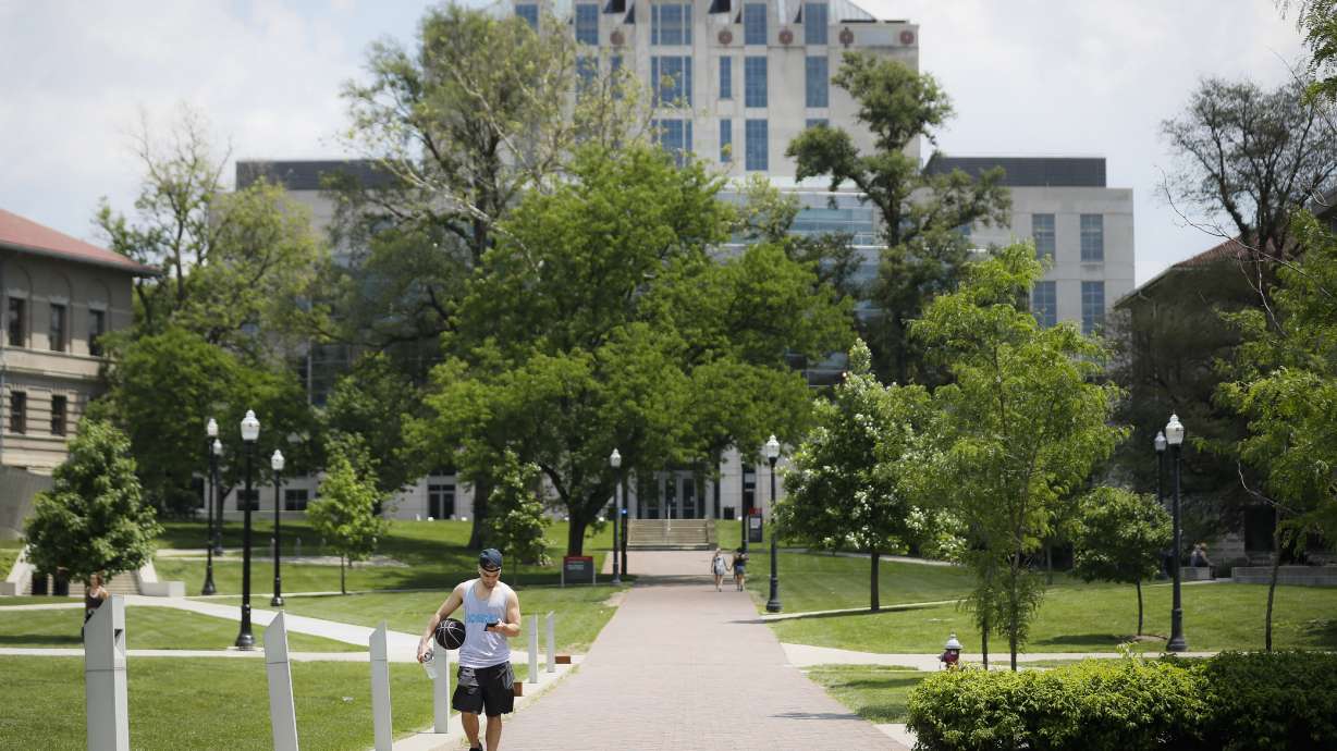 The Latest: Doctor's family says reports of abuse painful