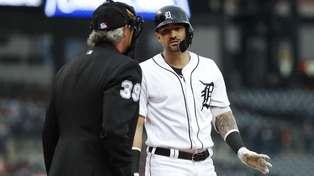 Marlins blow lead, then recover to beat Tigers 5-4 in 11