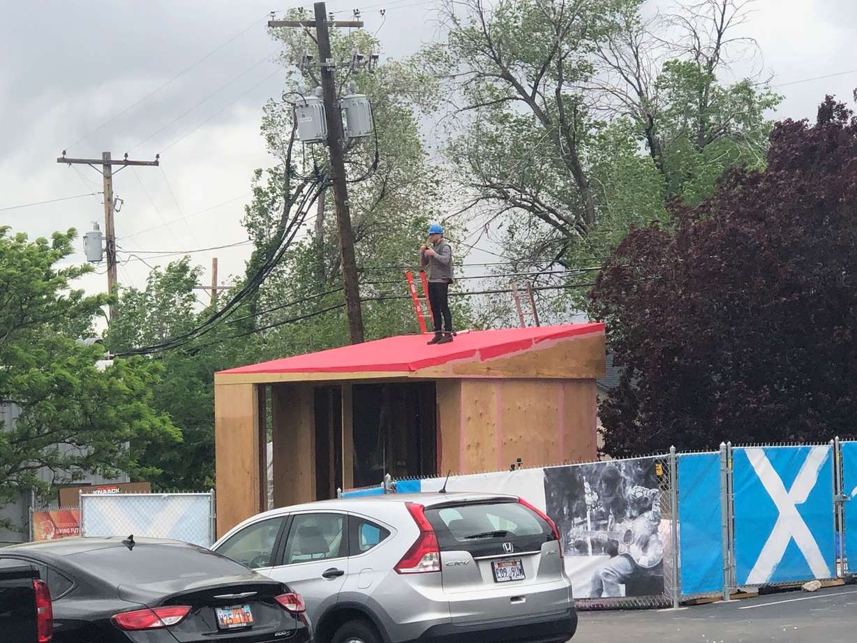 An architect stands on the roof of a tiny home at Architectural Nexus in Salt Lake City on Thursday, May 16, 2019. Photo: Whitney Evans, KSL.com