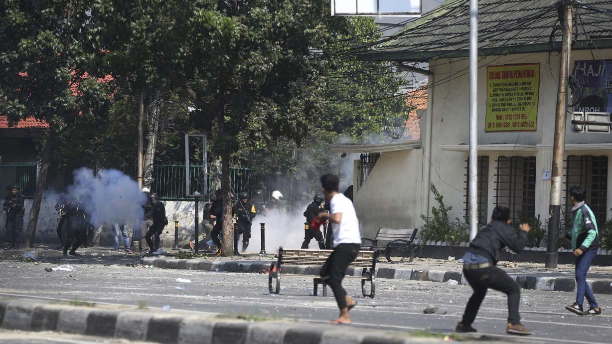 The Latest: Widodo says he won't tolerate security threats