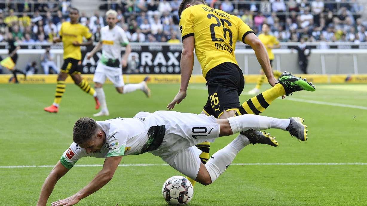 Dortmund signs midfielders Thorgan Hazard, Julian Brandt