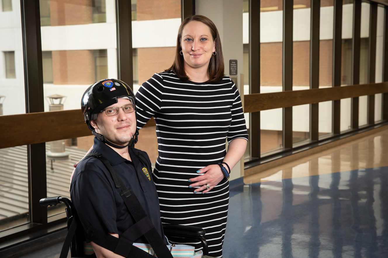 Montana State Trooper Wade Palmer, left, poses for a photo with his wife, Lindsey Palmer, at the University of Utah Hospital in Salt Lake City. Wade Palmer was shot while investigating a shooting that killed one person and wounded two others in Missoula on March 15. He was later flown to the University of Utah Hospital for treatment. He returned home on Wednesday, May 22, 2019. (Photo: Charlie Ehlert, University of Utah Health)