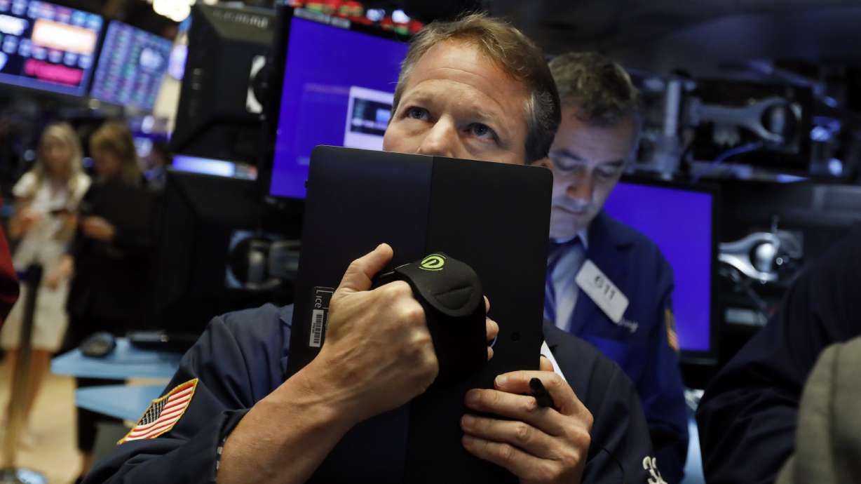 Markets Right Now: Stocks tumble on trade fears; oil down 5%