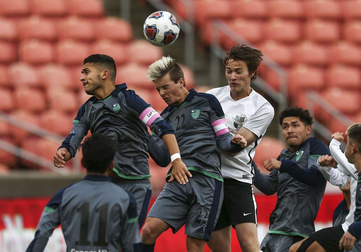 Copper Hills High School Ethan Anderson (22) jumps to head the ball during a corner kick against the Weber Warrios during the UHSAA 6A Soccer Championship game at Rio Tinto Stadium in Sandy on Thursday, May 23, 2019. (Photo: Silas Walker, KSL)
