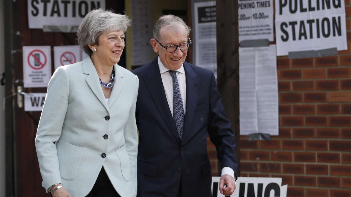 The Latest: PM May resigns, won't lead Britain out of EU