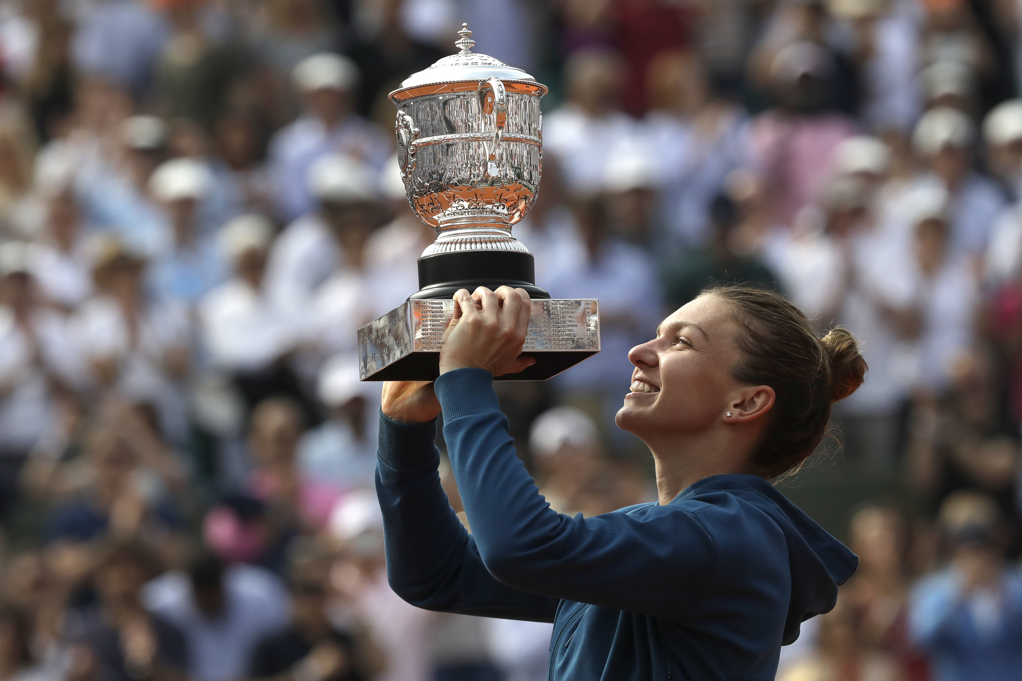 Unfamiliar, but nice: Halep back in Paris to defend title