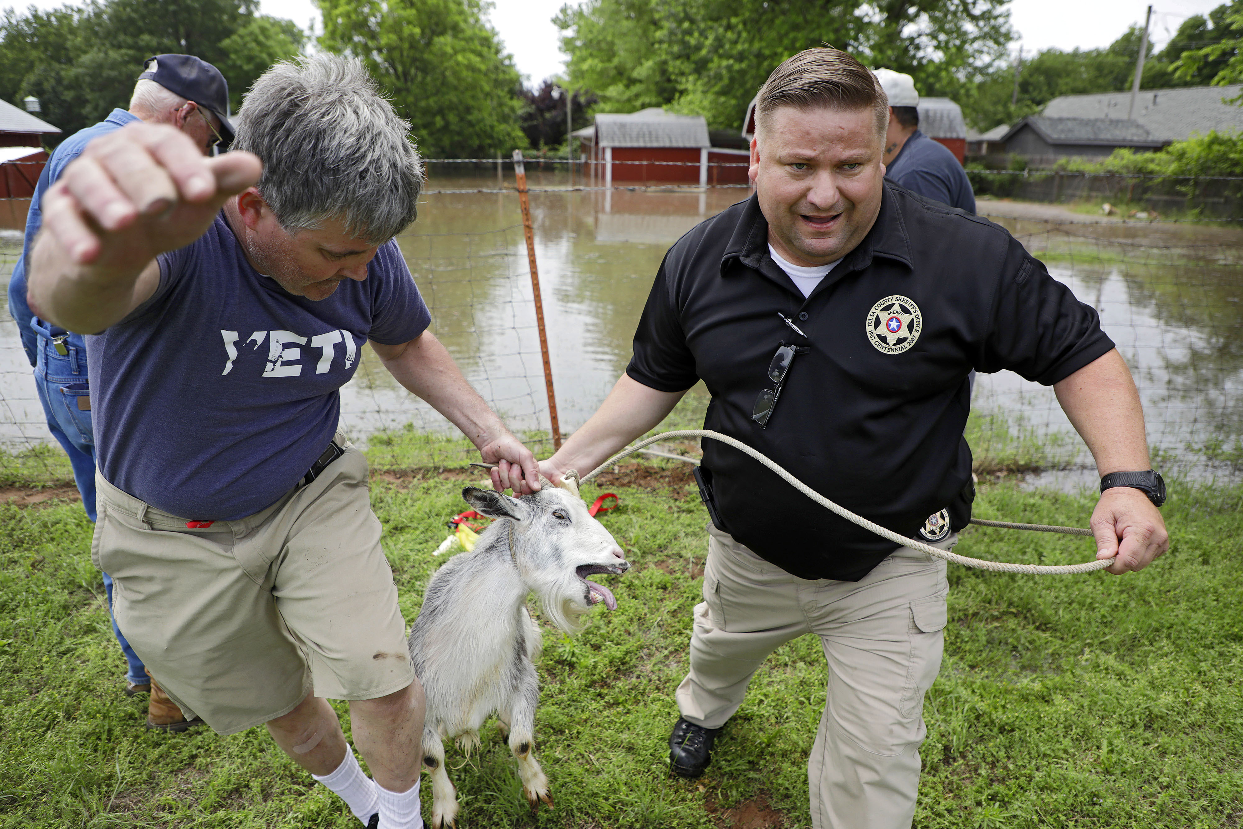 The Latest: Tornado touches down near Iowa City