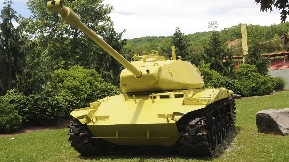 Ready, aim, oops! Historic tank turns lemon-lime yellow