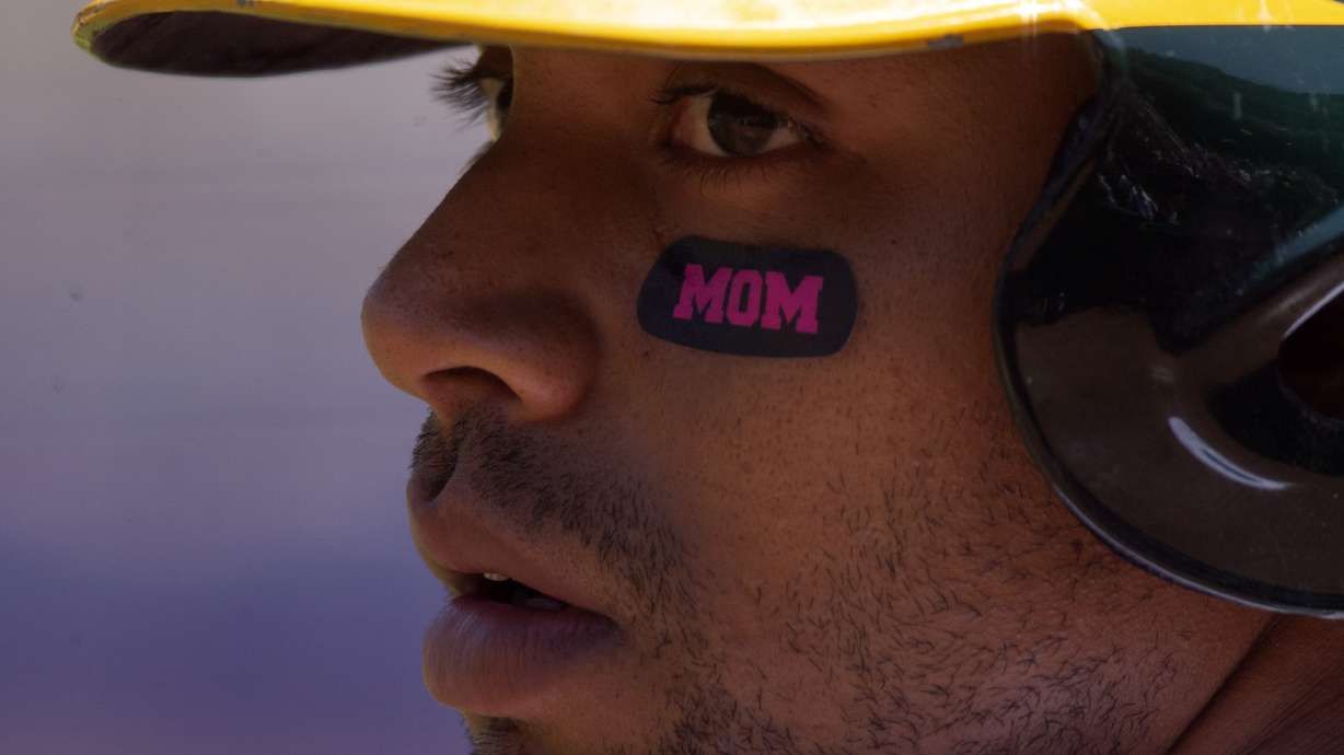 A's place Khris Davis on injured list with hip contusion