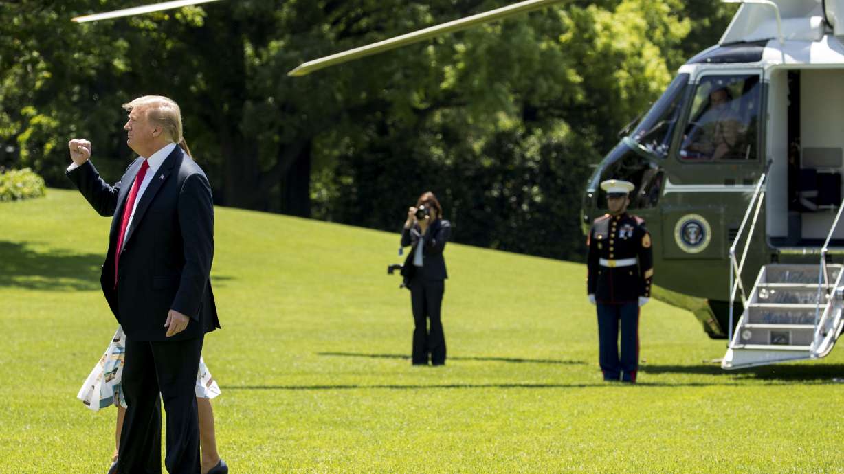 The Latest: Trump meets troops in Alaska en route to Japan