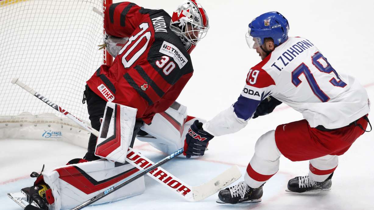 Canada, Finland advance to world hockey title game