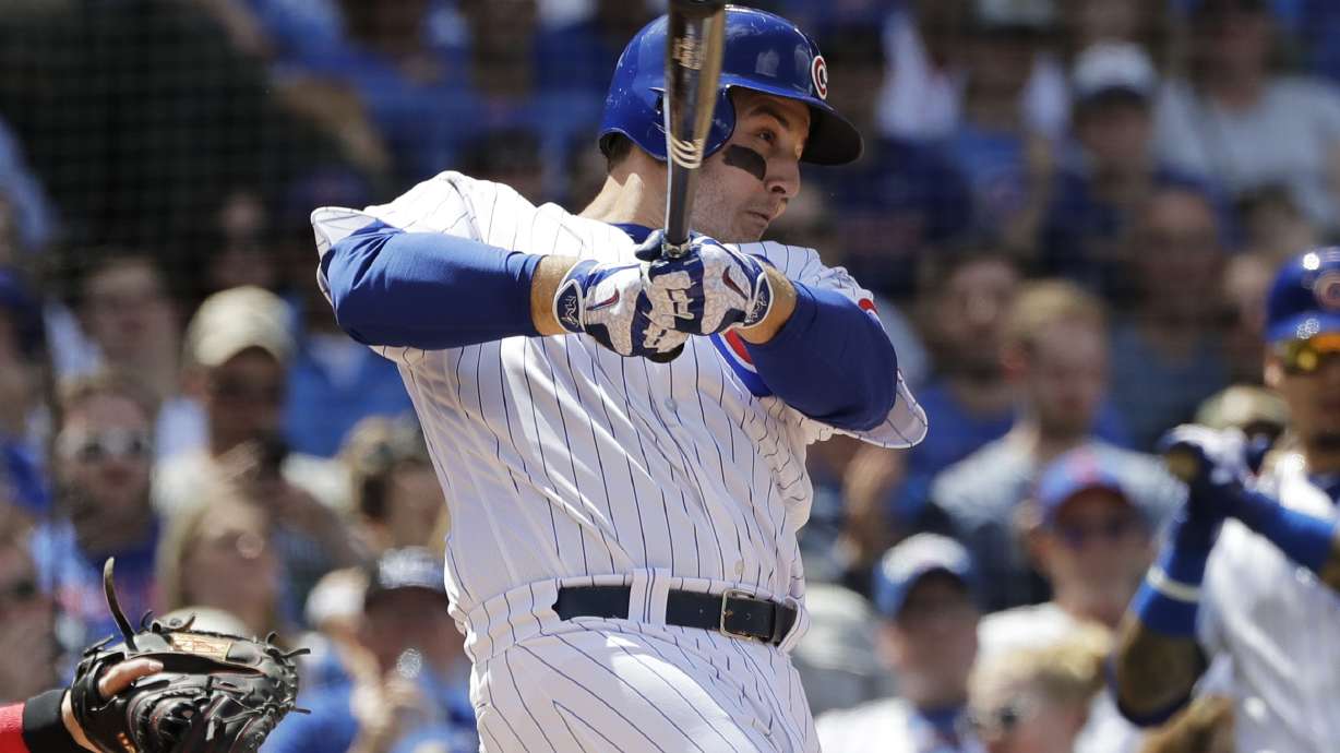 Cubs top Reds 8-6 in wild 6-HR game