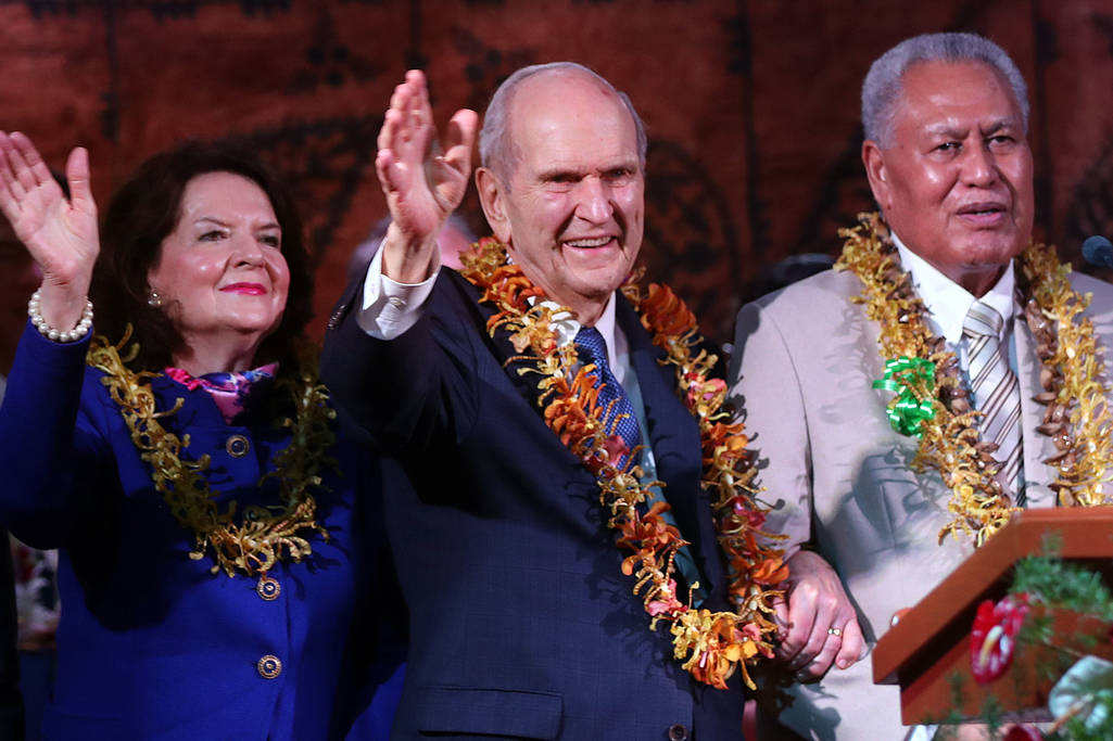 President Russell M. Nelson of The Church of Jesus Christ of Latter-day Saints, center, and his wife, Sister Wendy Nelson, wave to those in attendance following a devotional in Apia, Samoa on Saturday, May 18, 2019. At right is His Highness Tuimaleali'ifano Va'aleto'a Eti Sualauvi II, Samoa Head of State. (Photo: Ravell Call, KSL)