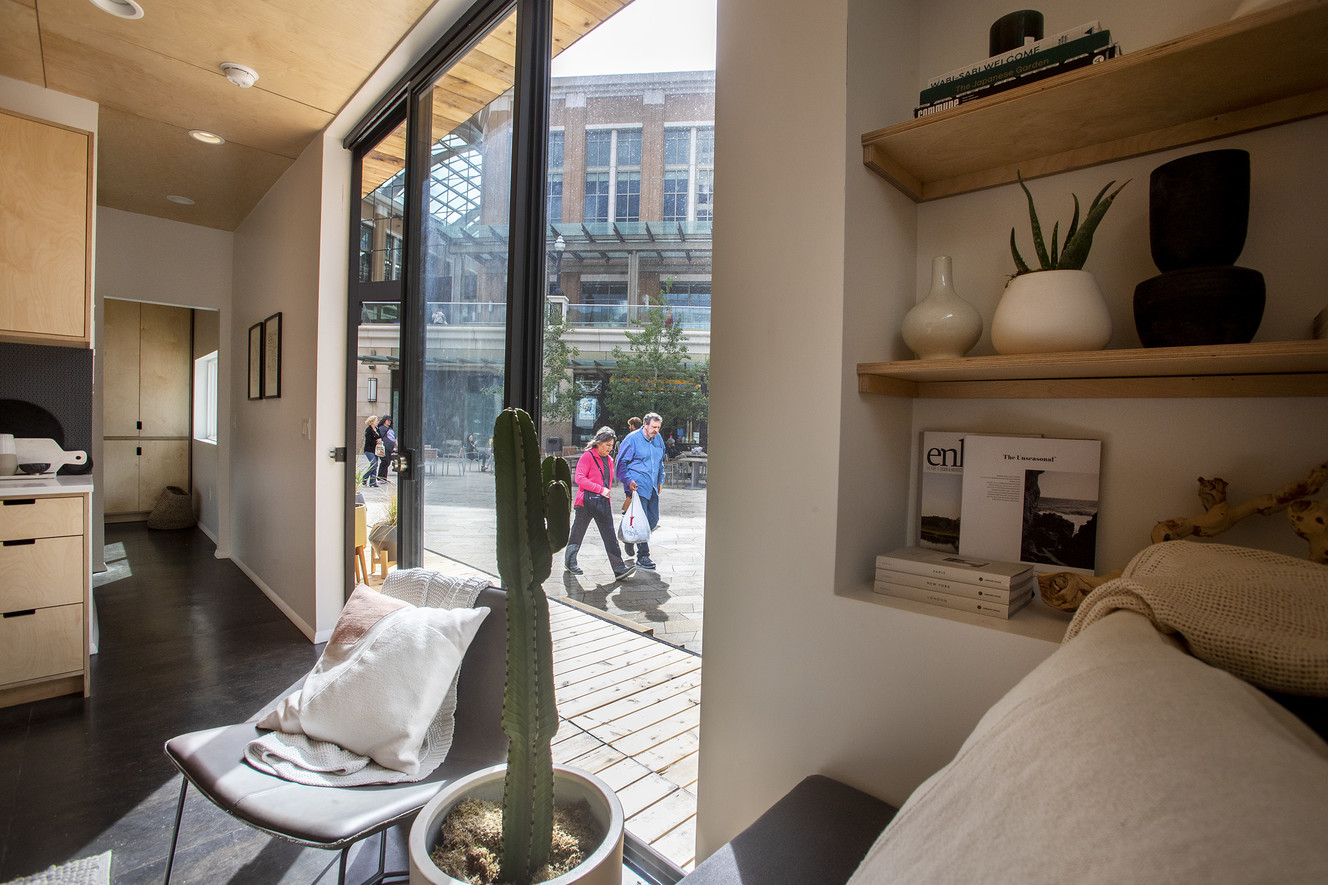 People walk past a Modal Living home at City Creek Center in Salt Lake City on Monday, May 20, 2019. (Photo: Scott G Winterton, KSL)