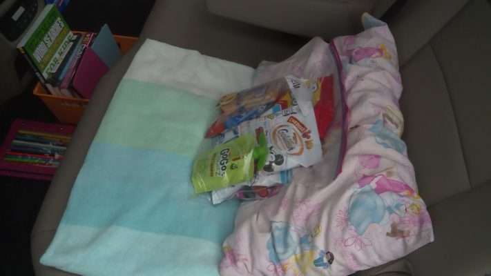 Jessica Sanders includes a beach towel and a small travel pillow for her kids’ comfort on her road trips from Utah to Disneyland. (Photo: KSL TV)