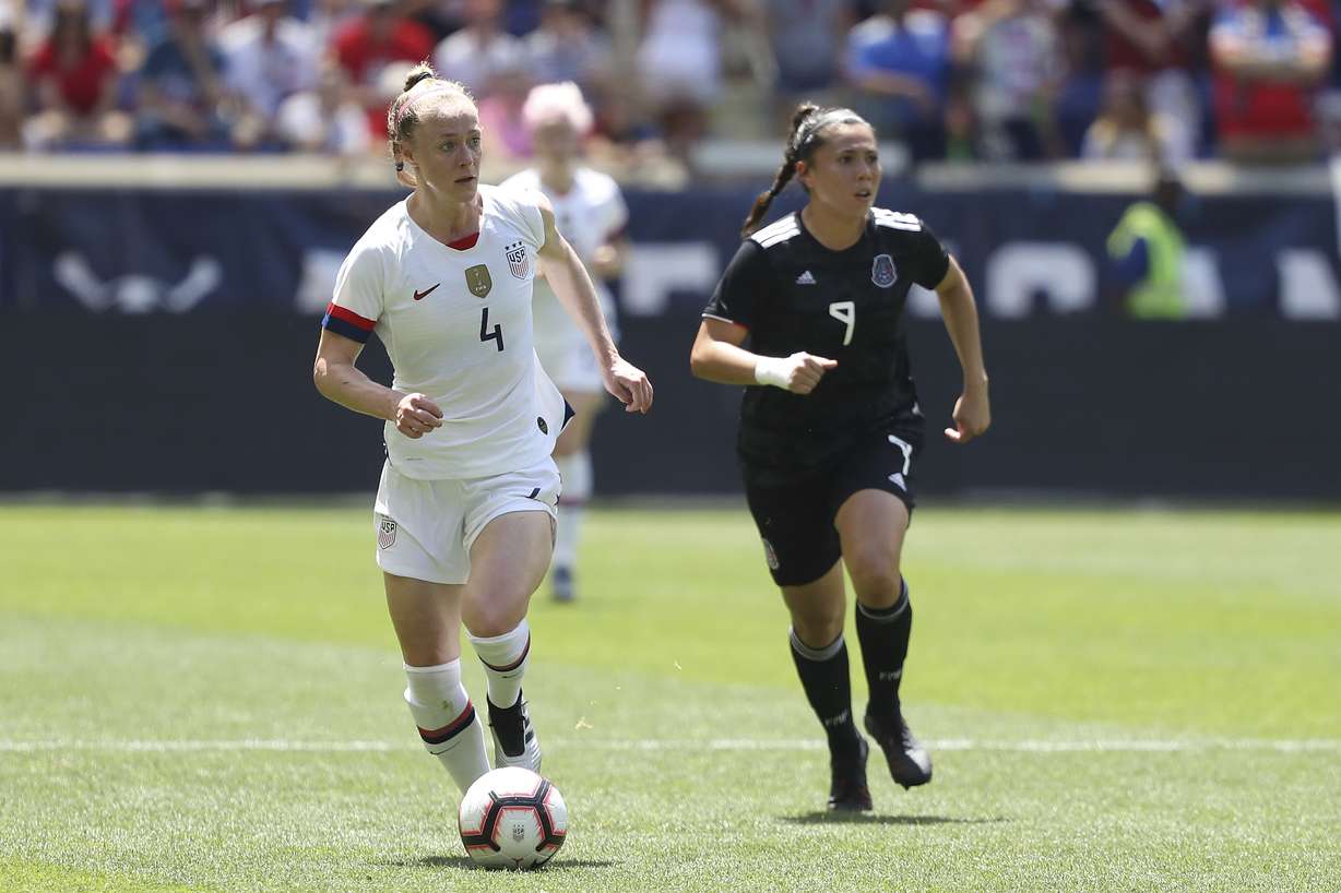 United States defender Becky Sauerbrunn, left, moves the ball up the pitch away from Mexico forward Kiana Palacios during the first half of an international friendly soccer match, Sunday, May 26, 2019, in Harrison, N.J. The U.S. won 3-0. (Photo: Steve Luciano, AP)