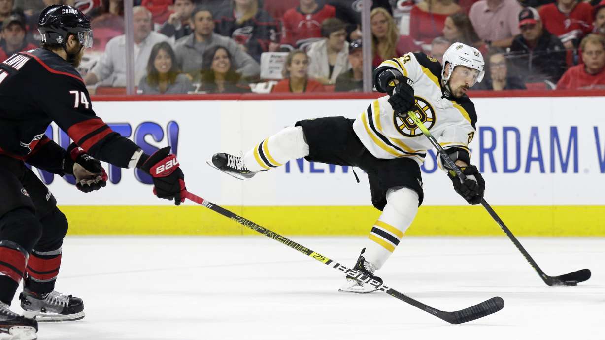 The Latest: Boston defensemen lead charge in Game 1