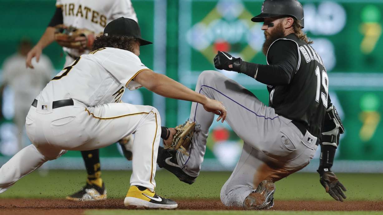 Blackmon heads to injured list with strained right calf