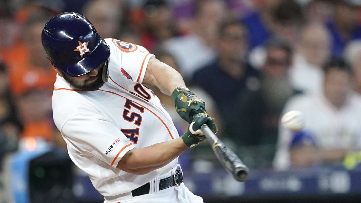 Cole fans 12 as Astros down Cubs 6-5