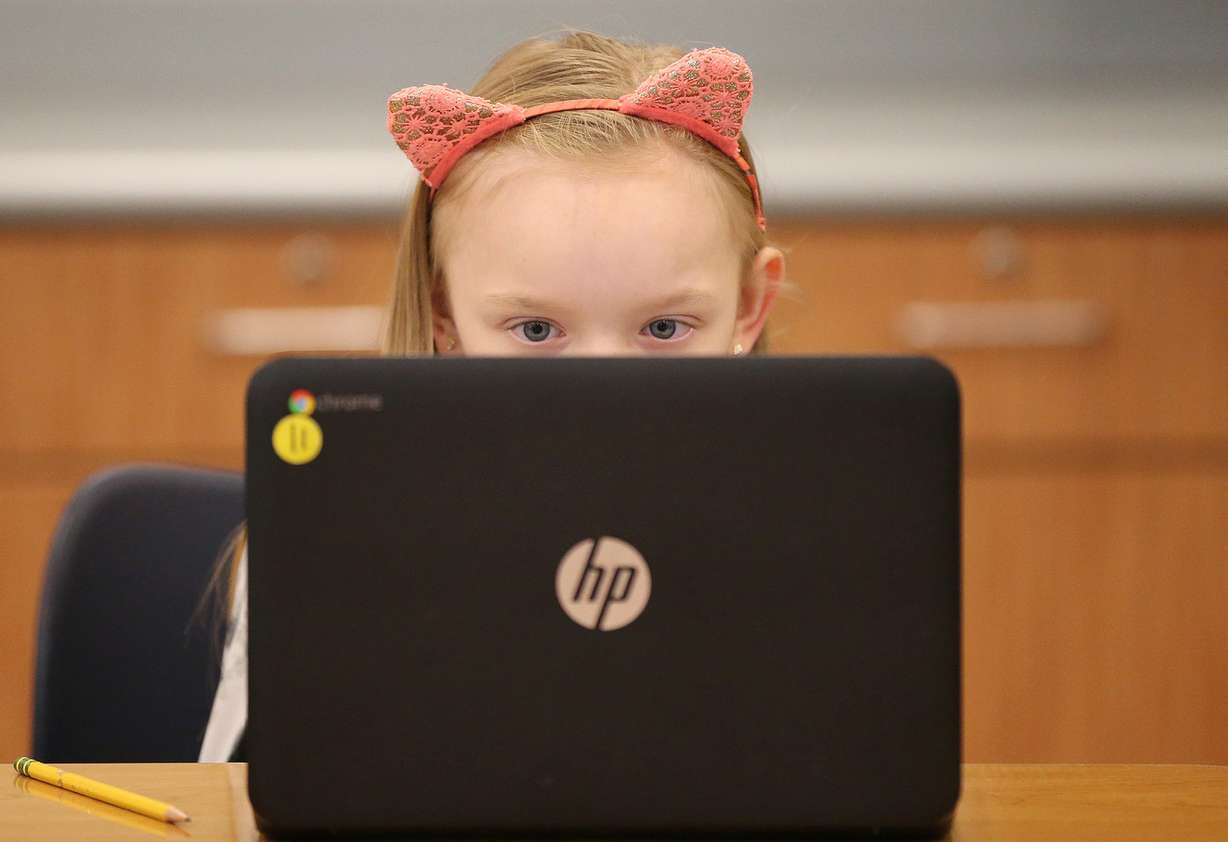 Midvale Elementary School third-grade student Kylie Lancaster works from a laptop in Midvale on Wednesday, Jan. 16, 2019. (Photo: Jeffrey D. Allred, KSL)