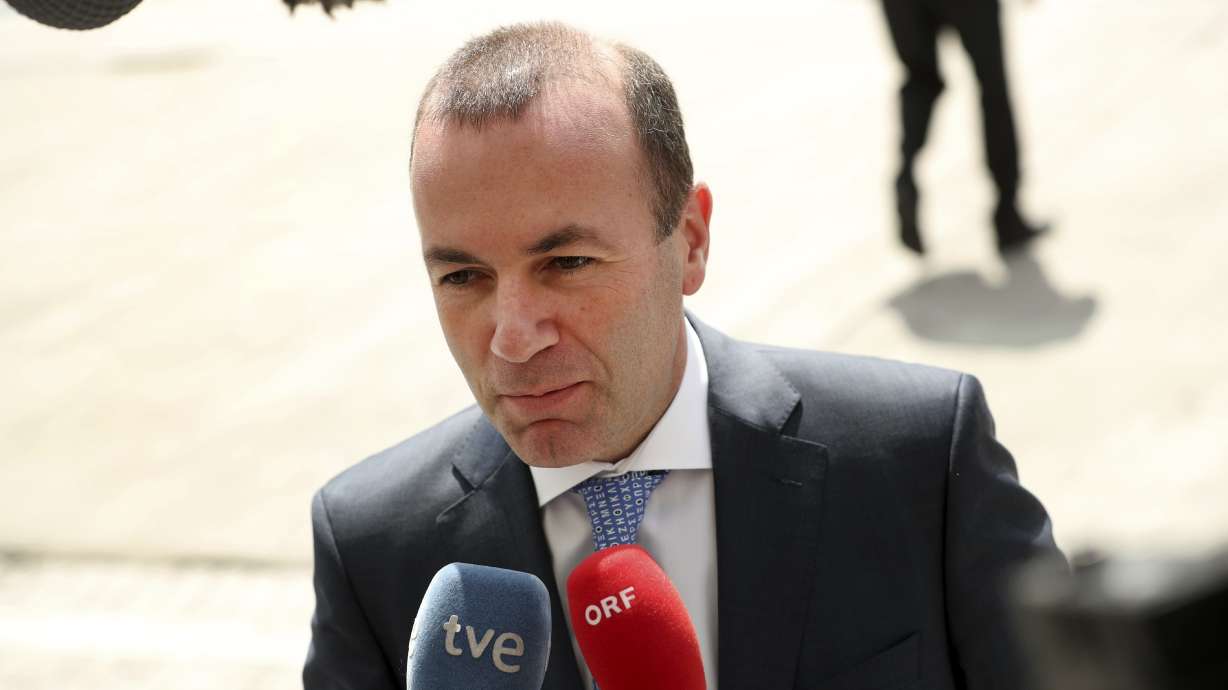 The Latest: Macron wants commission head with experience