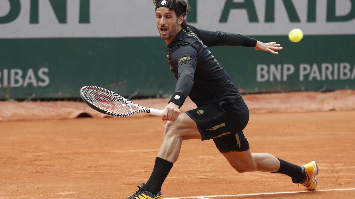 Old timer's day: Karlovic, Bryan bros. in wins for the ages